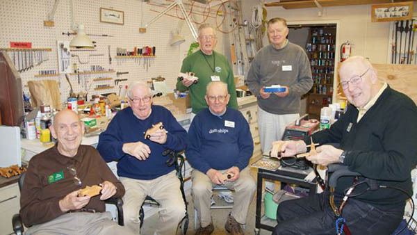 Left: Members of the Wooden Toys for Charity Group. From left: Bill Dumar