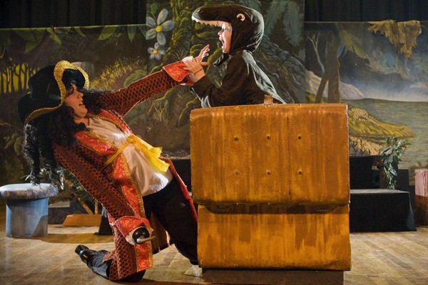 “Croc” played by Alaina Kettering tries to bite “Captain Hook” played by Valerie Kettering during a rehearsal for the upcoming musical play production by students of Rose Hill Elementary School.