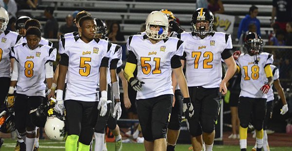 Jason Medeiros (51) exits the field with his teammates at last month’s Eastbay Youth All-American Bowl.