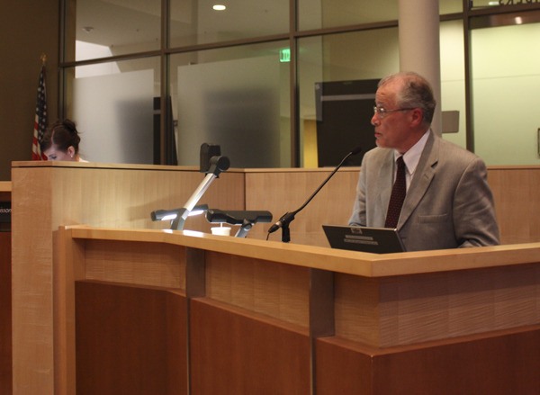 Education Hill resident Steve Gasser addresses the Redmond City Council during Tuesday night's appeal hearing regarding the proposed Redmond Bike Park.