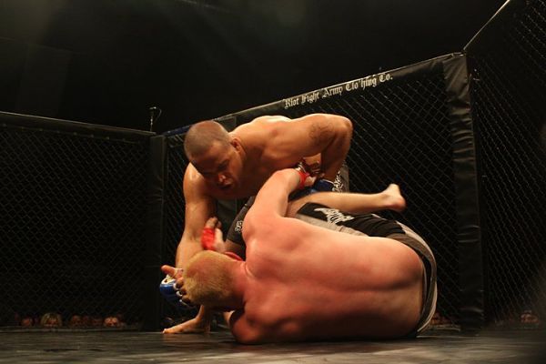 Anthony Hamilton takes down an opponent during an MMA bout. The Redmond native will fight for the heavyweight title at CageSport XXII this Saturday at the Emerald Queen Casino in Tacoma.