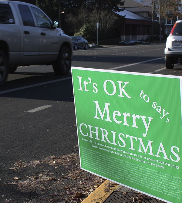 Someone posted Christmas signs around Redmond over the weekend. Here's one near the Redmond Regional Library.