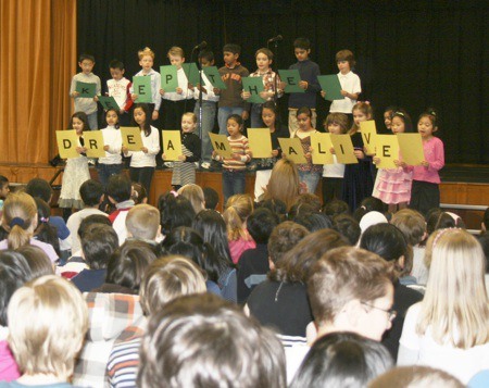Katharyn McDonnell's second grade class sang a song about keeping Rev. Dr. Martin Luther King Jr.'s dream alive during an assembly organized by sixth grade students at Rosa Parks Elementary School. Thursday's event included skits
