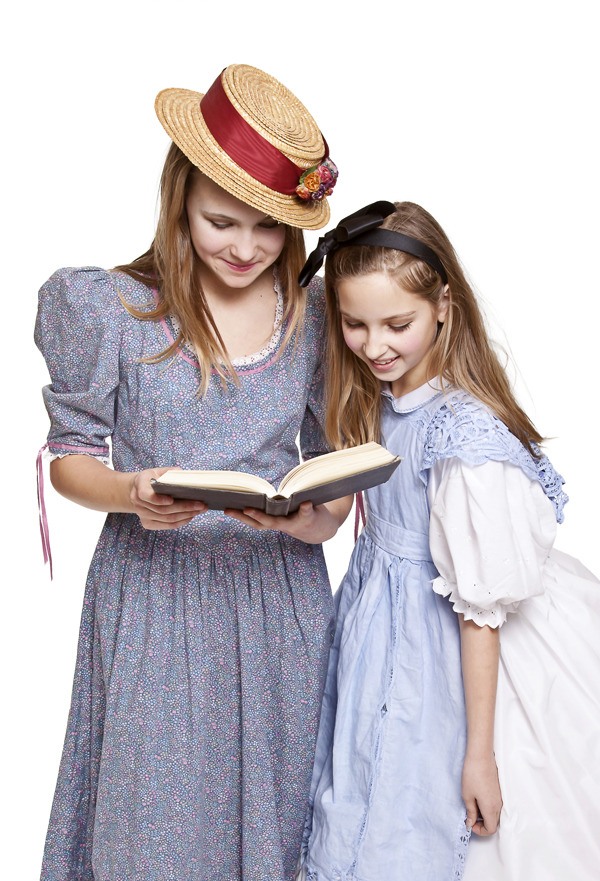 Sixth-graders Eleanor Huss (left) and Caroline Lundy play Clara and Alice in the Dickinson-Explorer adaptation of the Lewis Carroll classic. The musical production is a collaborative effort with Studio East in Kirkland.