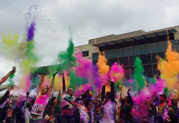 Festival of Color attendees rang in spring last Saturday at Redmond City Hall with colored powder. This was the festival’s third year.