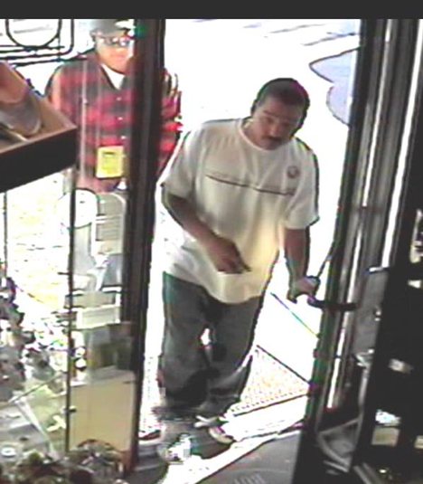Two Latino suspects restrained and duct taped a female clerk and a customer during an armed robbery last Sunday at Preciado Northwest in Redmond while making off with $450 and jewelry. Anyone with information about these suspects should call the Redmond Police Department at (425) 556-2586.