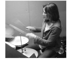 Redmond resident Sarah Allen Pella will be a guest drummer with folk trio Rebecca Riots at SoulFood Books April 30.