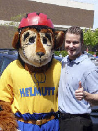 Helmutt and Dr. Eric Hansen will be handing out free bicycle helmets on May 17.