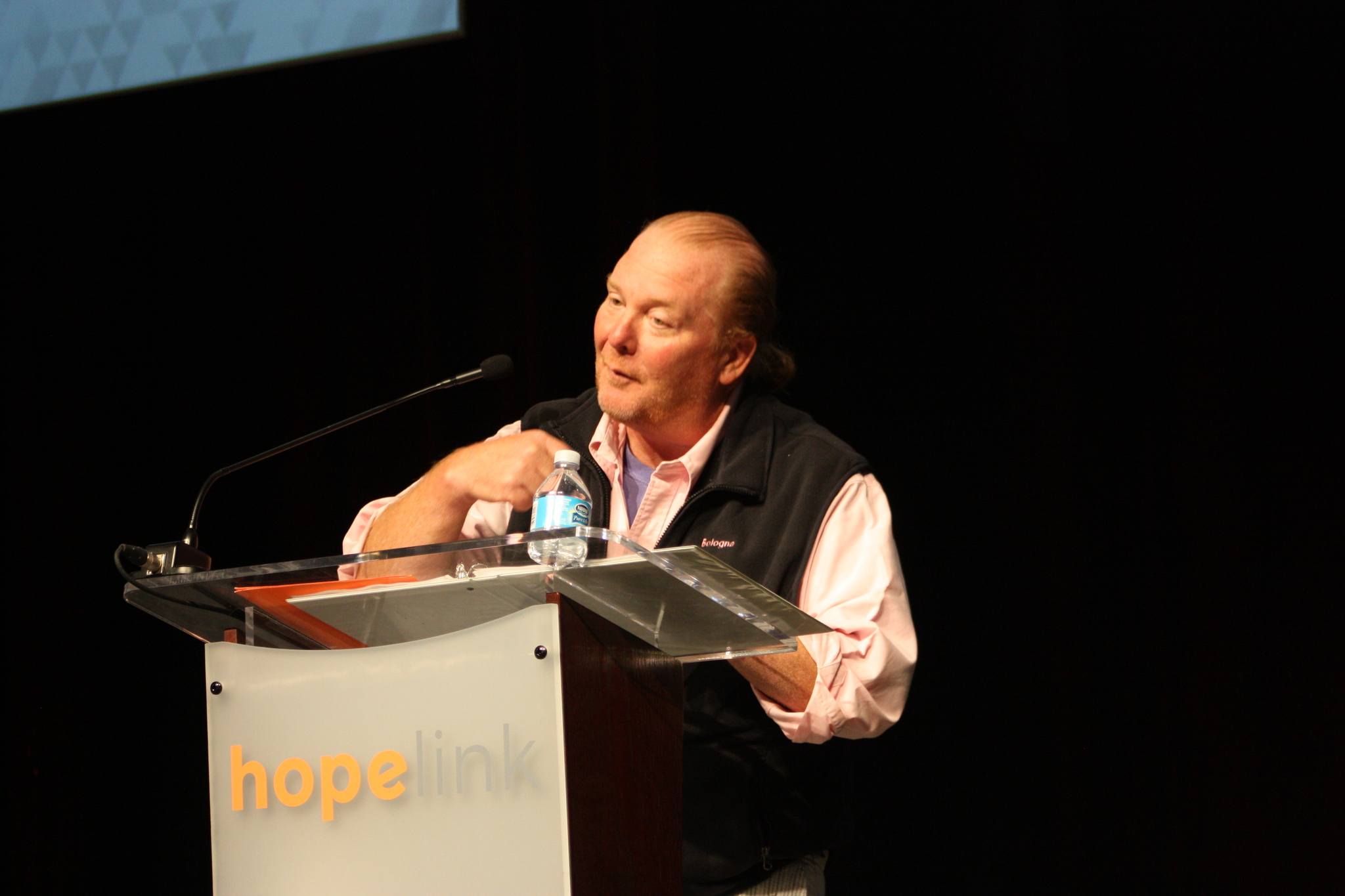 Chef and Seattle-area native Mario Batali shares one of many food-related stories at Hopelink’s Reaching Out Luncheon on Monday at the Meydenbauer Convention Center in Bellevue. Samantha Pak, Redmond Reporter
