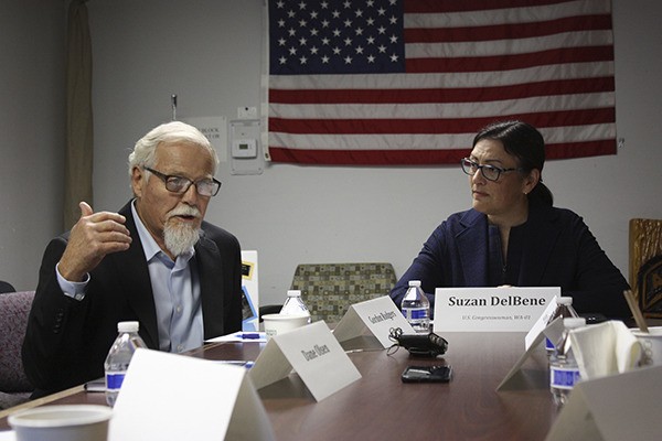 Gordon Rogers (left) discusses his experience and others’ at Rep. Suzan DelBene’s (right) first Veterans Advisory Board meeting at the VFW in Redmond.