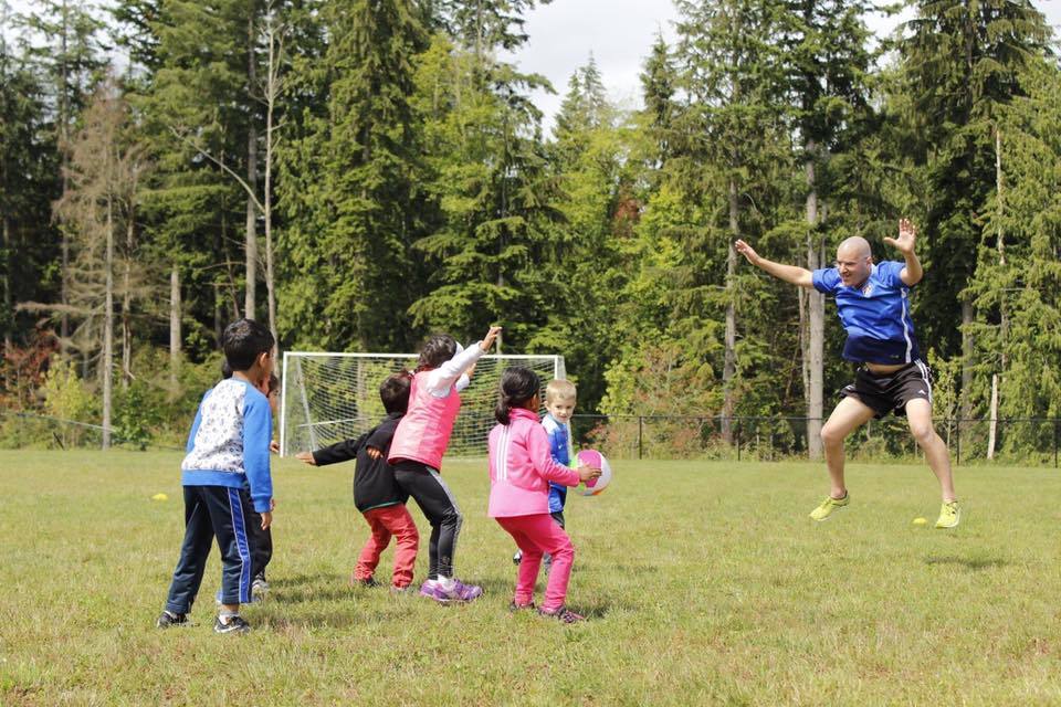 John Towers leads a soccer session this summer on Redmond Ridge. Courtesy photo