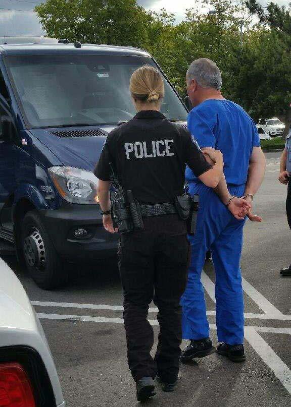 Redmond police arrest Dr. Bruce A. Klein. Courtesy of the Redmond Police Department