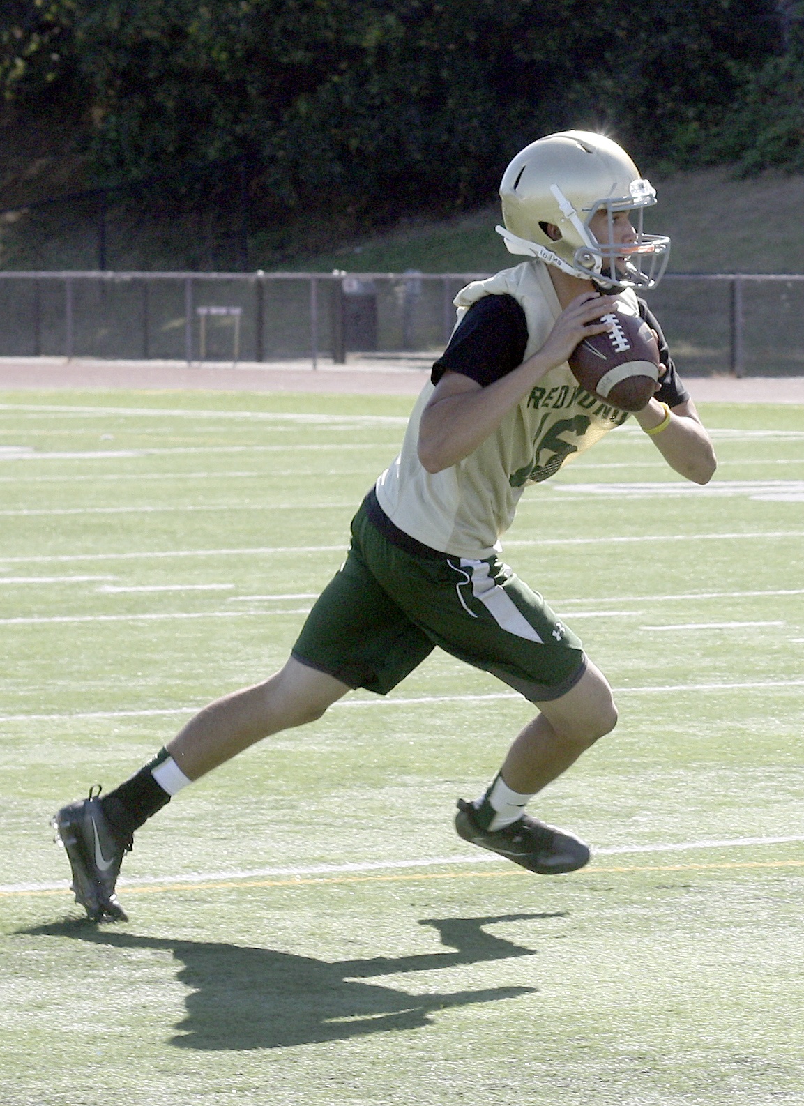 Redmond High junior starting quarterback Teryn Berry prepares to throw on Monday during practice. Andy Nystrom