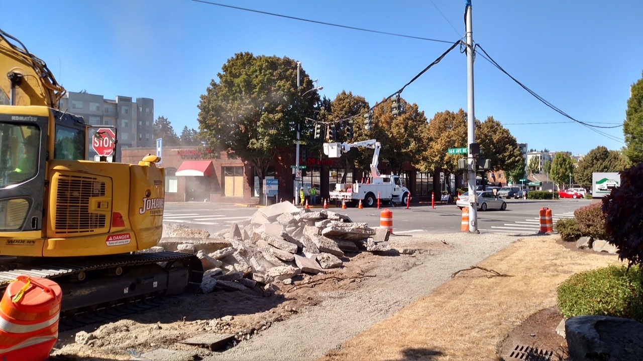 Construction crews for the two-way conversion project work along Redmond Way at 164th Avenue Northeast.