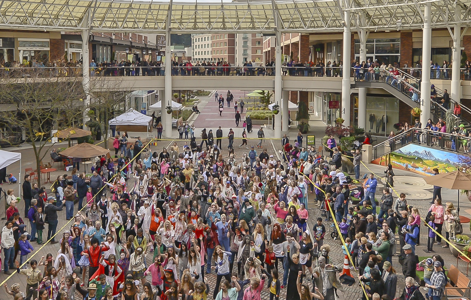 Zombies dance during last year’s “Thrill the World” at Redmond Town Center. Reporter file photo