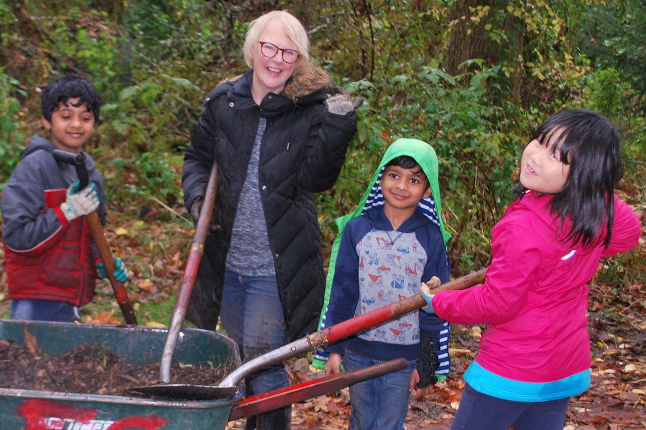 Volunteers attend planting events to help restore three parks on Green Redmond Day