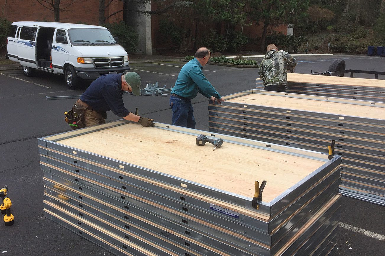 Redmond firefighters lend a hand to Camp Unity Eastside; homeless encampment sets up at St. Jude Catholic Church
