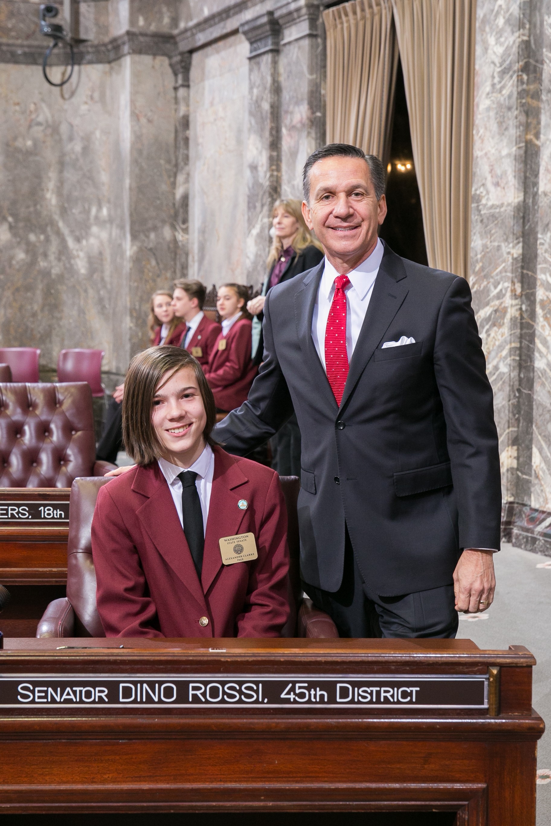Alexander Clarke with Sen. Dino Rossi. Courtesy of Washington State Legislature