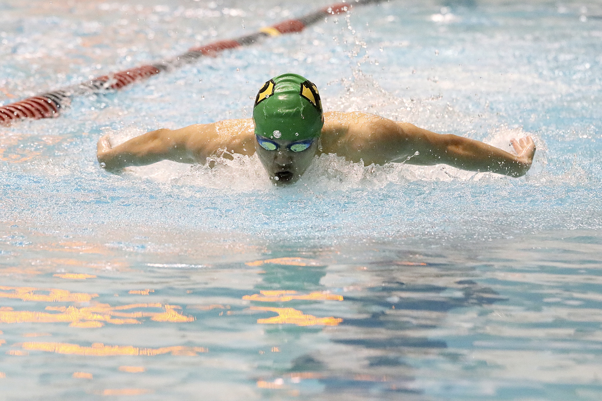 Redmond’s Ivan Graham competes in the 100-yard butterfly at state. Graham placed third in the event with a time of 50.65. Joe Livarchik, Mercer Island Reporter