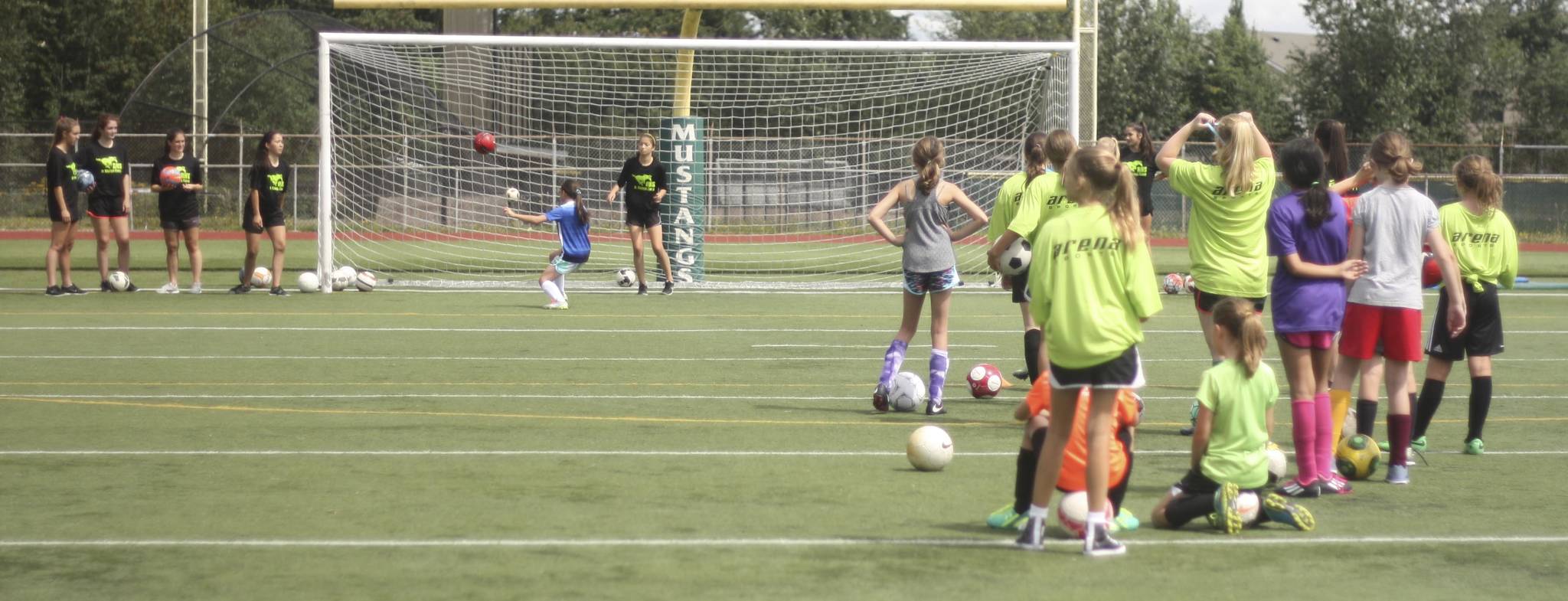 Girls soccer players get in on the action at last year’s camp. Reporter file photo