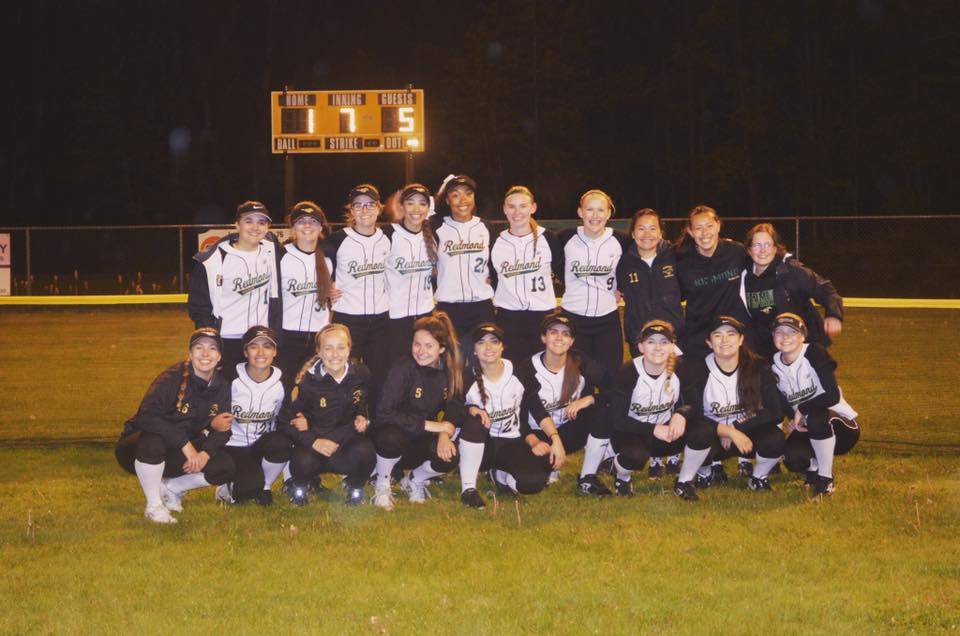 Redmond’s softball team following a recent victory. Courtesy of the Redmond High School Fastpitch Booster Club