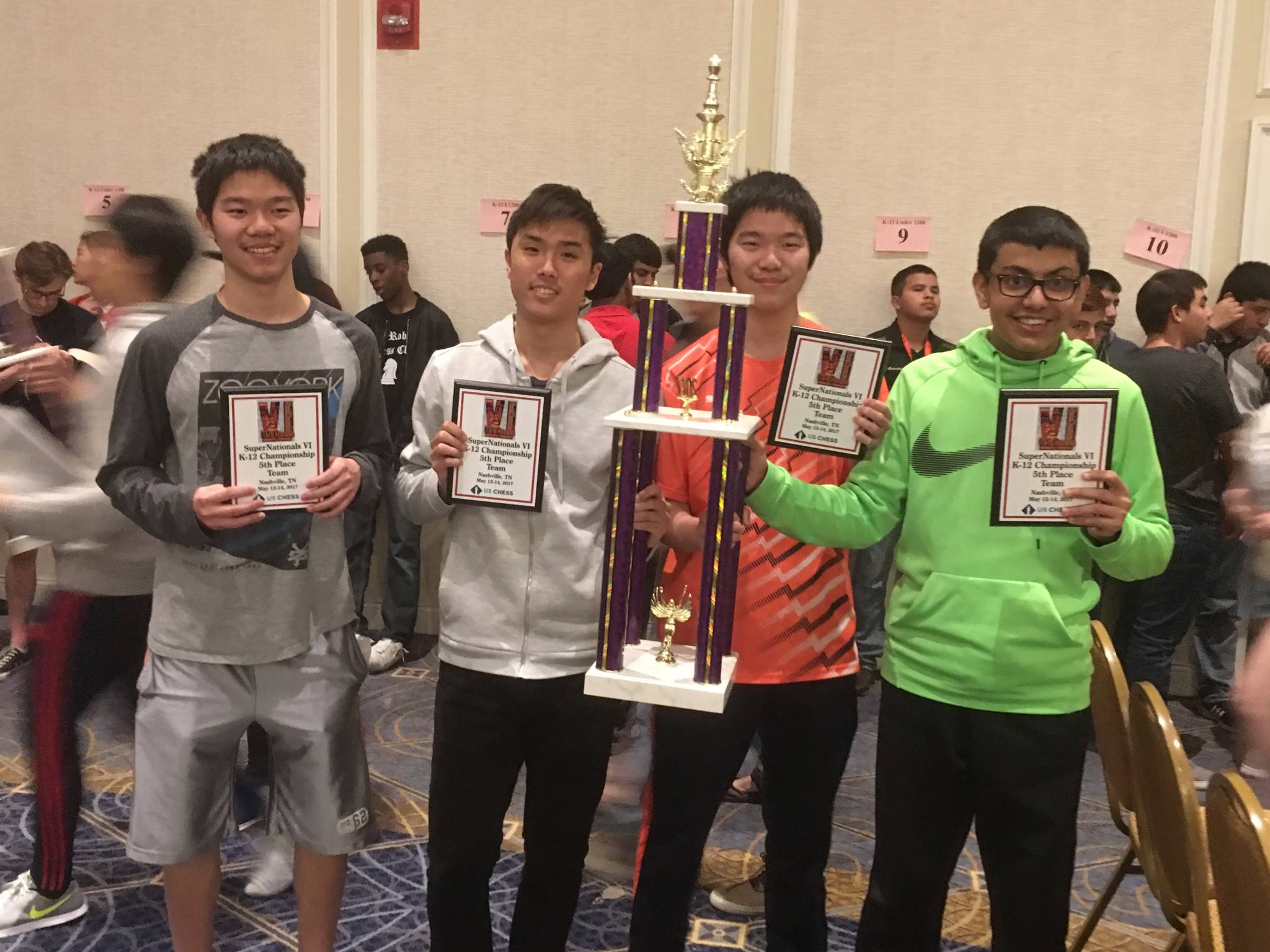 The four students from Redmond High School who competed in the U.S. Chess Federation national championship took home a fifth-place award last weekend. Contributed photo