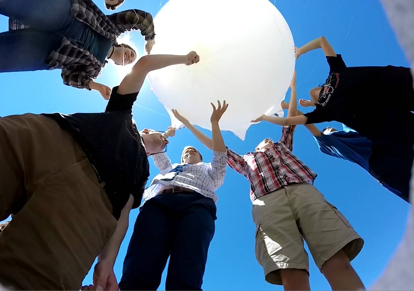 Students in the Redmond High School astronomy club prepare to launch their balloon. Contributed photo                                Students in the Redmond High School astronomy club prepare to launch their balloon. Contributed photo