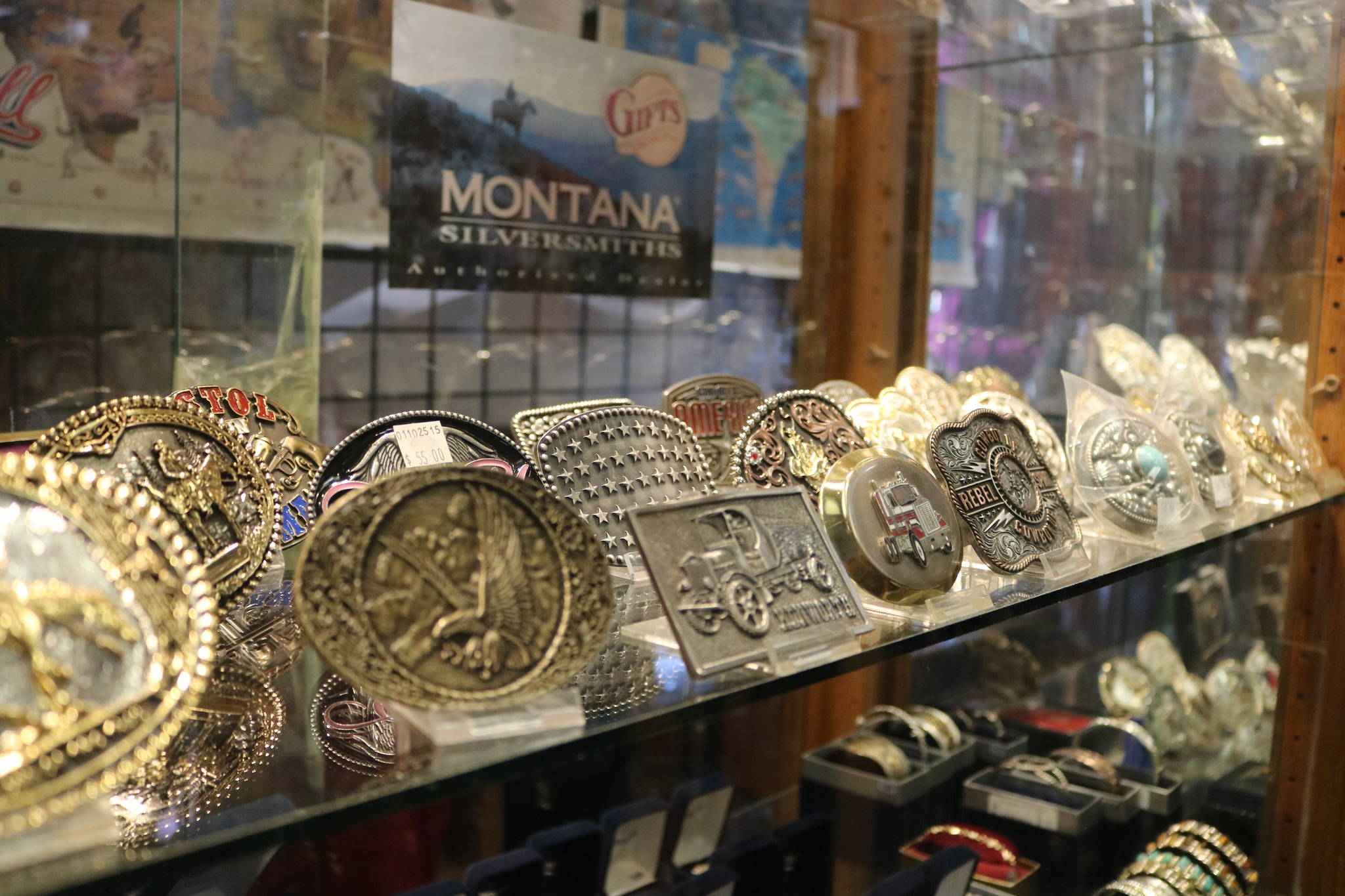 Belt buckles on display at Work and Western Wear in Redmond. Aaron Kunkler/Redmond Reporter