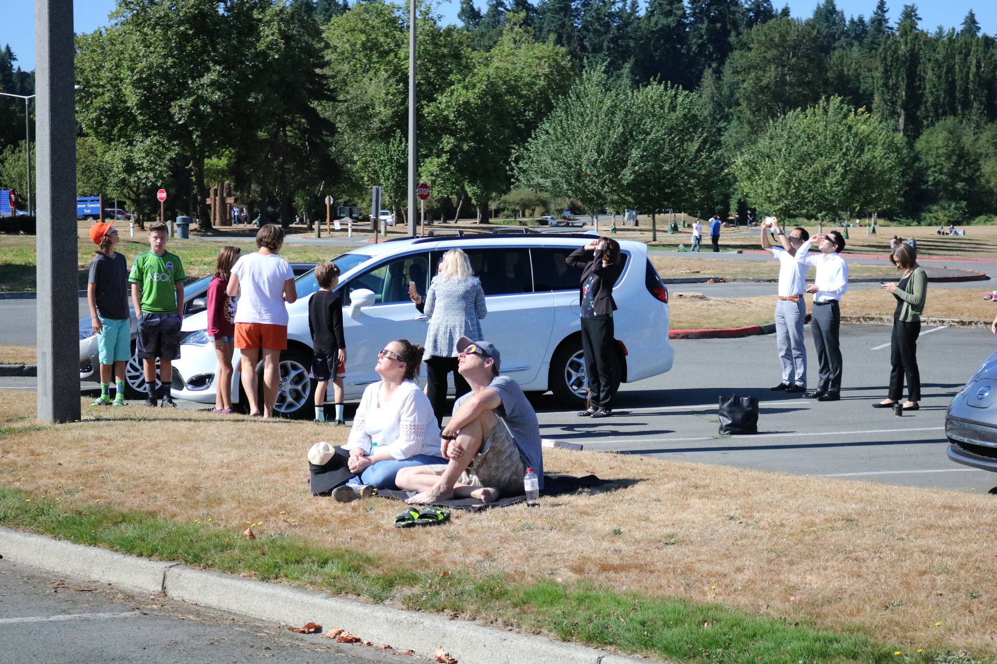 People gathered at Marymoor Park near Redmond on Monday to watch the partial solar eclipse. Aaron Kunkler/Redmond Reporter