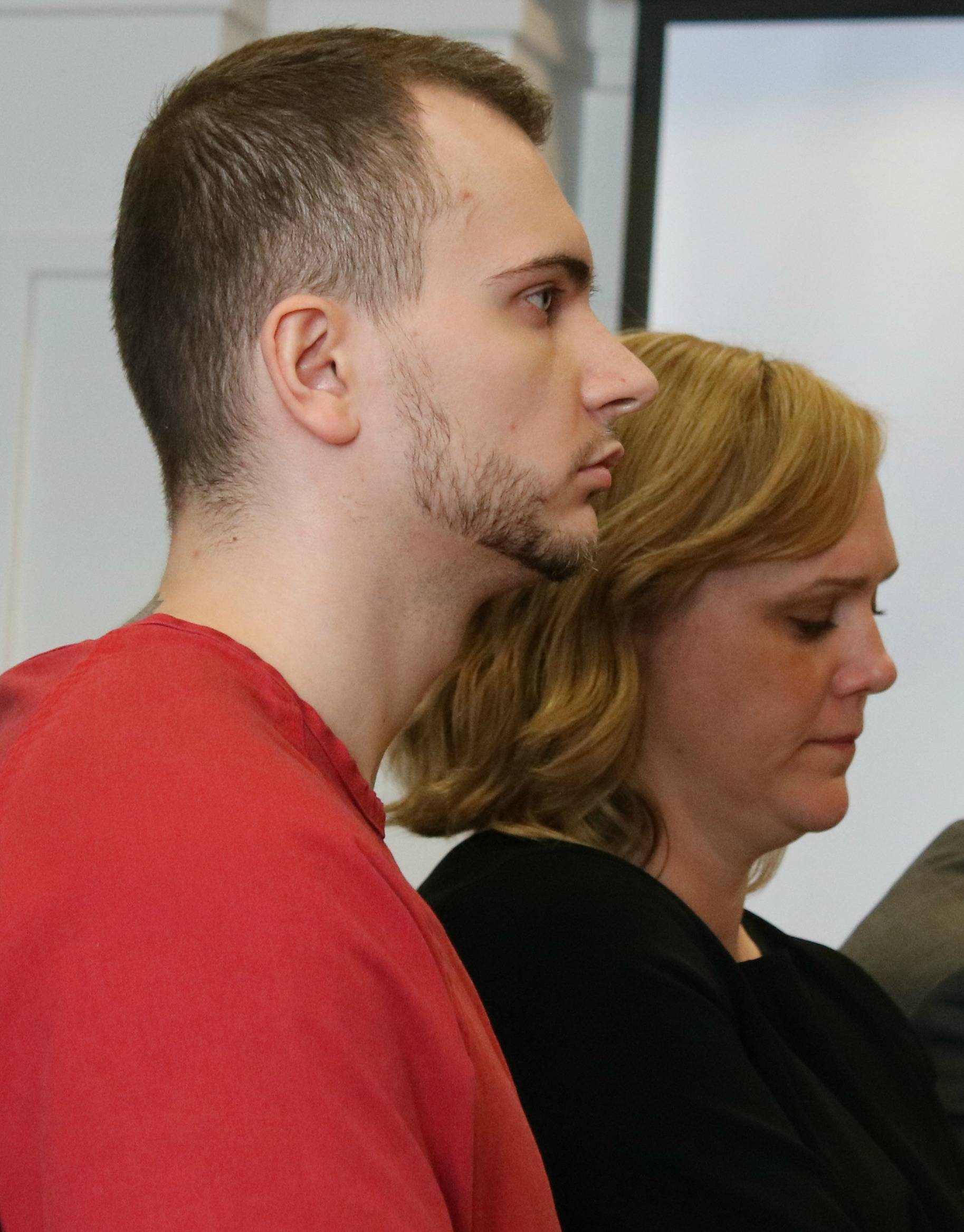 Mark Karasek listens to the judge hand down his sentence while standing next to his counsel Emma Scanlon on Friday afternoon at the King County Courthouse in Seattle. Andy Nystrom, Redmond Reporter