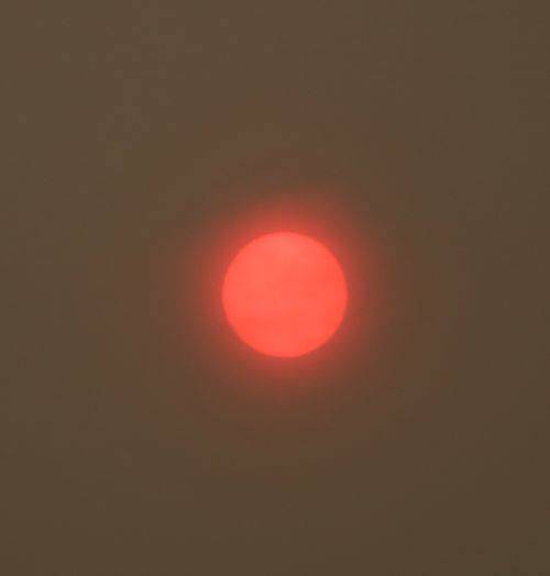 A hazy red sun on Tuesday morning was caused by wildfires. Andy Nystrom/ Redmond Reporter