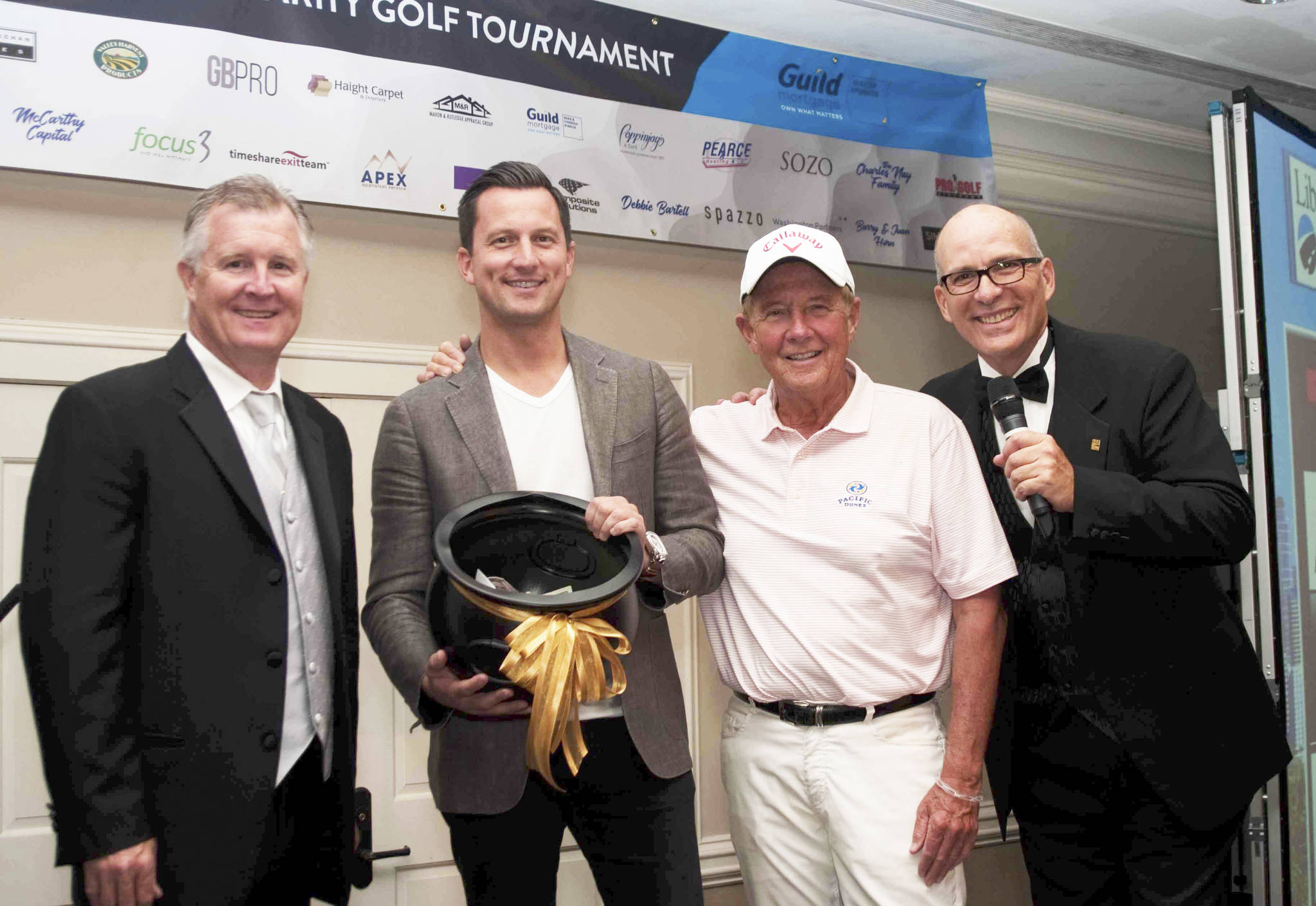 The 13th Annual Liberty Road Foundation Charity Golf Tournament and Dinner Auction raised more than $430,000 for those in need. The foundation is based in Redmond. Courtesy photo