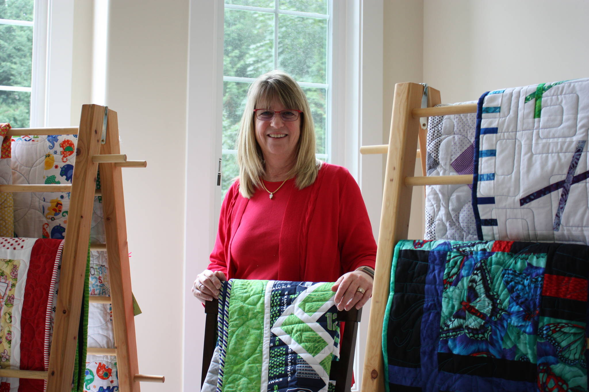 Stephanie Howarth showcases some of her creations at her home. She runs the quilting Etsy Sew Steph Studios. Aaron Kunkler/ Redmond Reporter