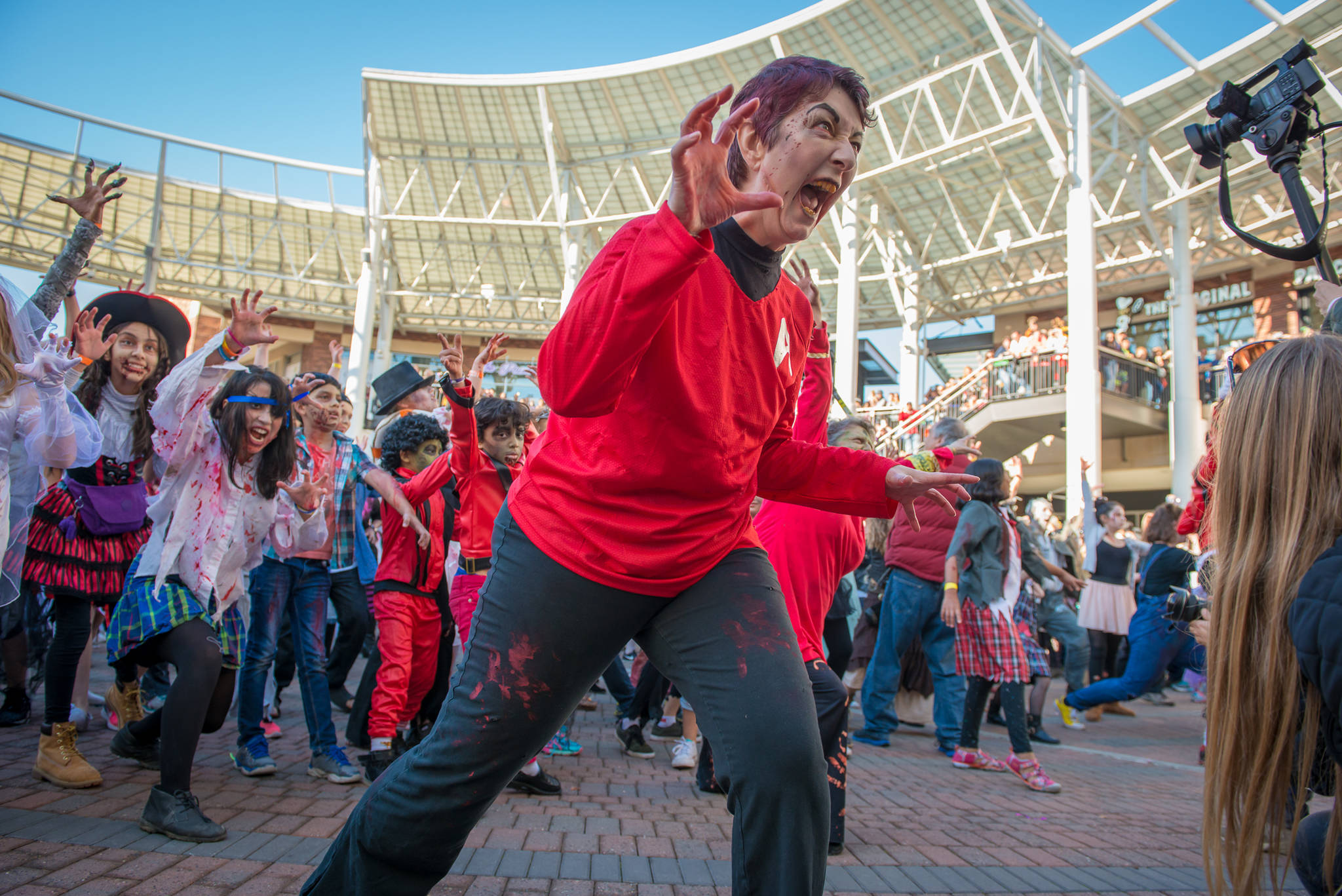 Redmond Town Center became zombie-fied last Saturday during the annual “Thrill the World” dance party. “Thrill the World” is simultaneously performed to Michael Jackson’s “Thriller” in more than 150 cities throughout 30 countries to raise money for charity. Redmond Zombies and nonprofit beneficiary Team Survivor Northwest host the event. Courtesy of Jessica Morgan