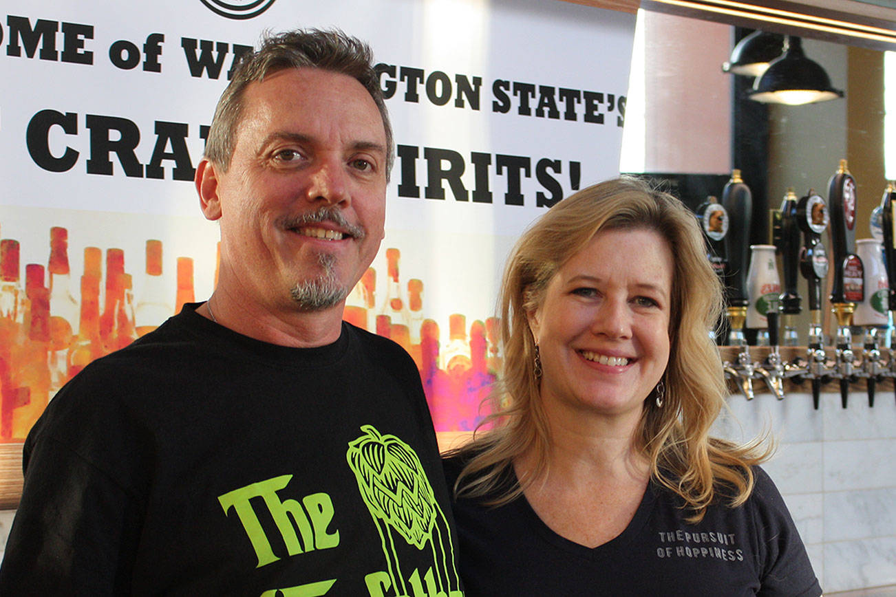 Greg and Ann Humes are the owners of the Hop House in Redmond, which boasts 75 taps. Aaron Kunkler/Redmond Reporter