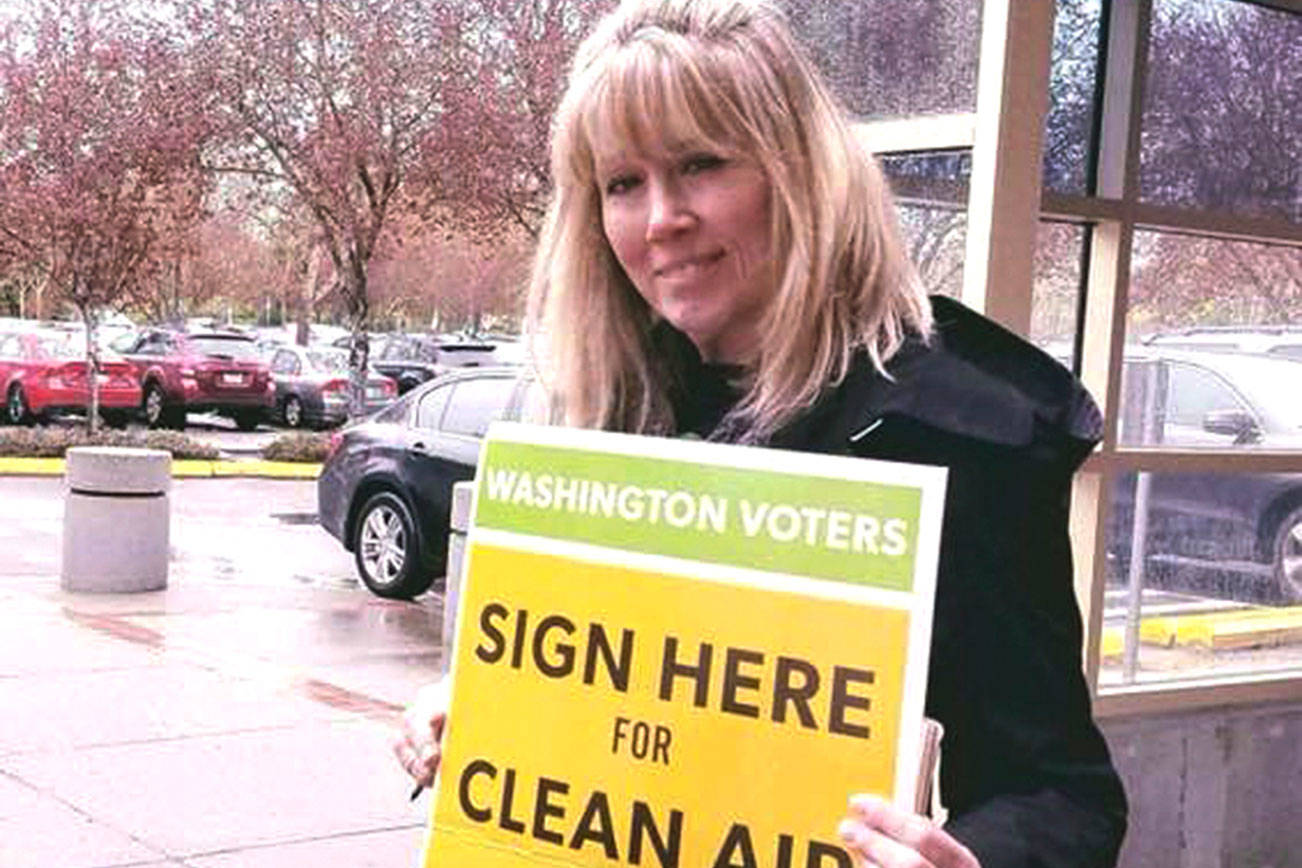 Activists begin collecting signatures for November carbon fee initiative