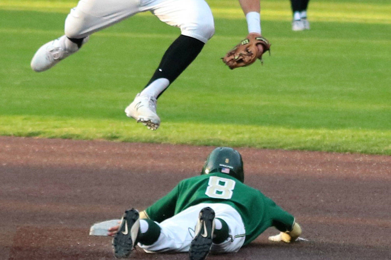 Andy Nystrom, staff photo                                Redmond Mustangs freshman Colin Curry (pictured below) stole second base in the top of the second inning against the Mercer Island Islanders in a KingCo 3A baseball playoff game on May 3 at Bannerwood Park in Bellevue. Mercer Island defeated Redmond 7-6.