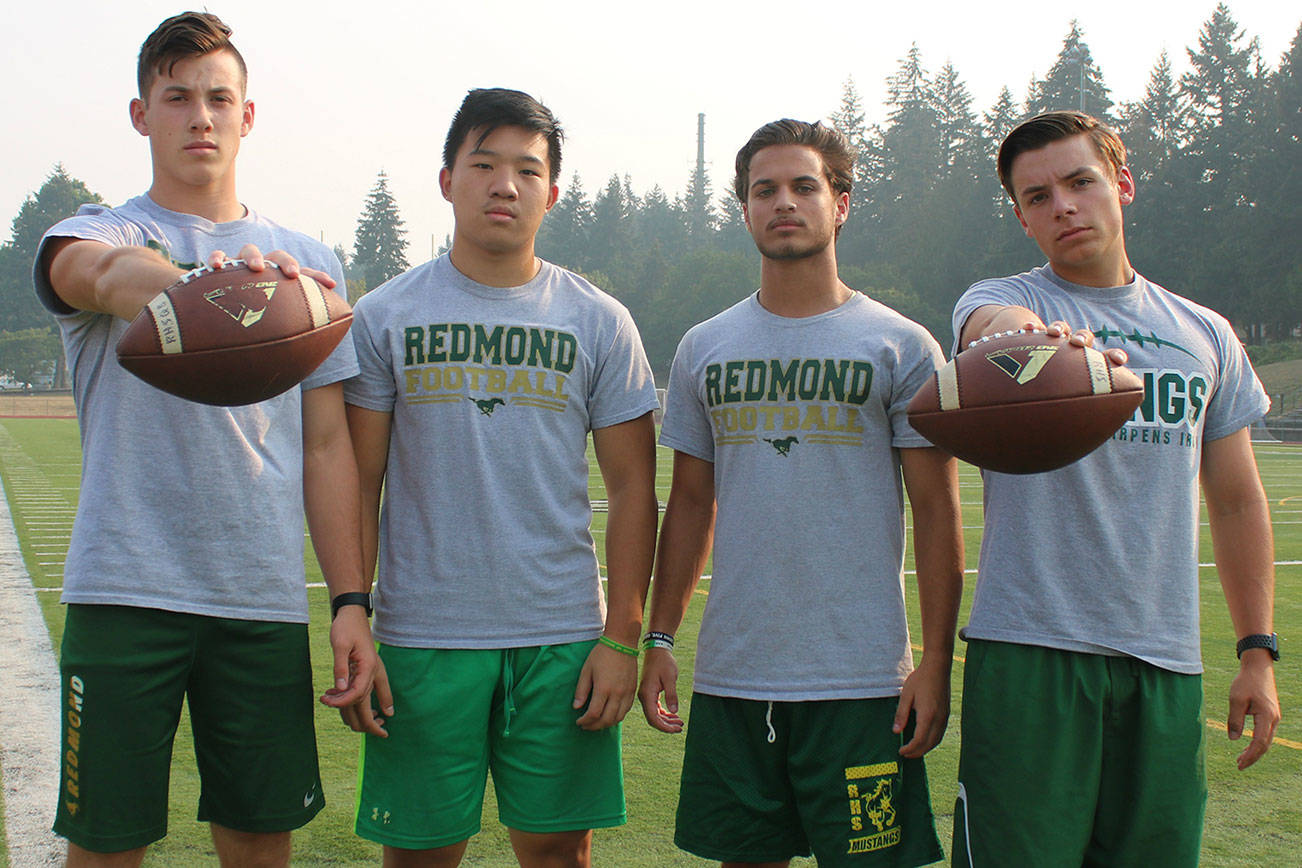 Redmond football will roll strong, tough, together