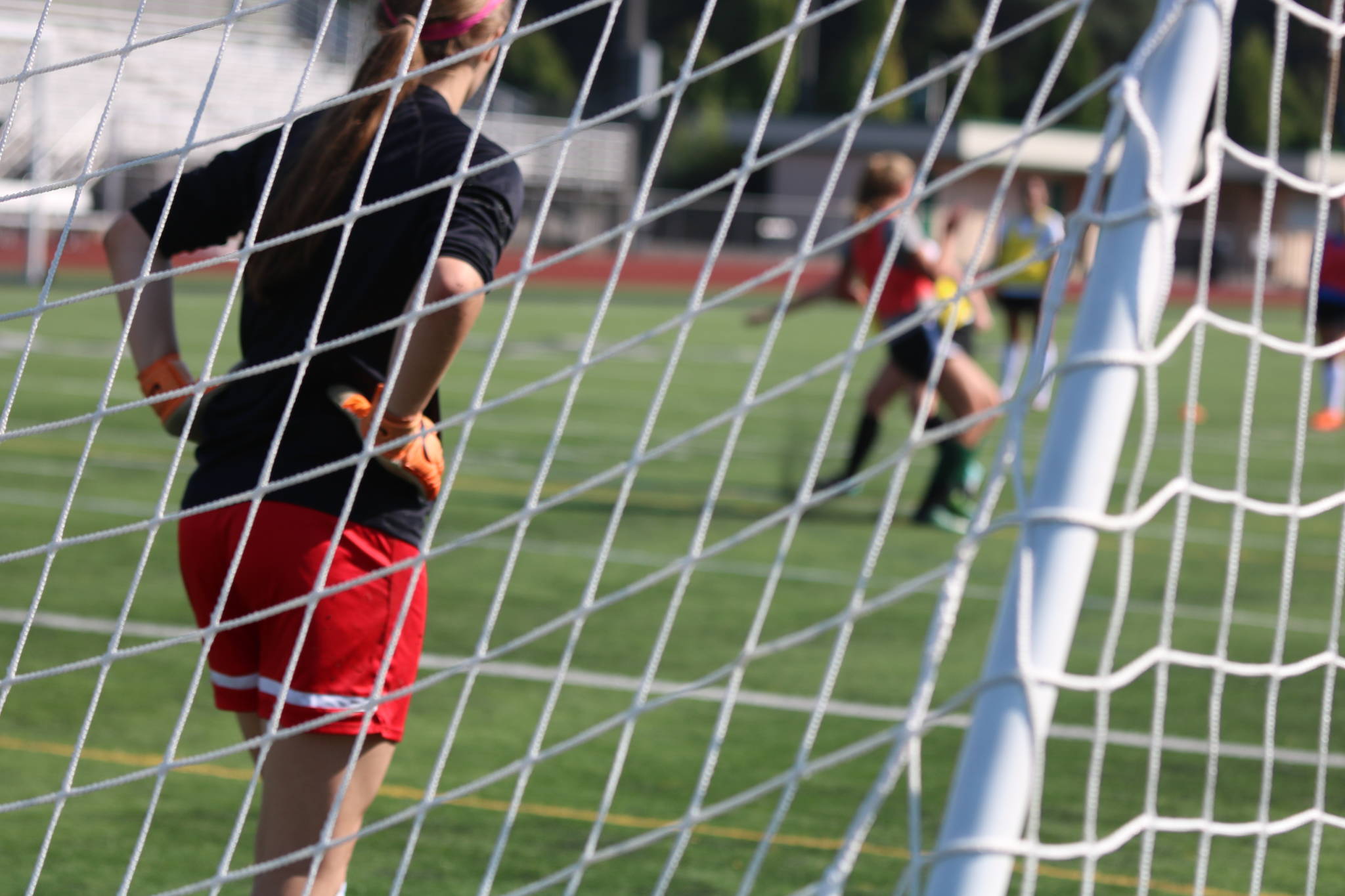 The scene from behind a goal at Redmond High’s Aug. 28 practice. Andy Nystrom / staff photo