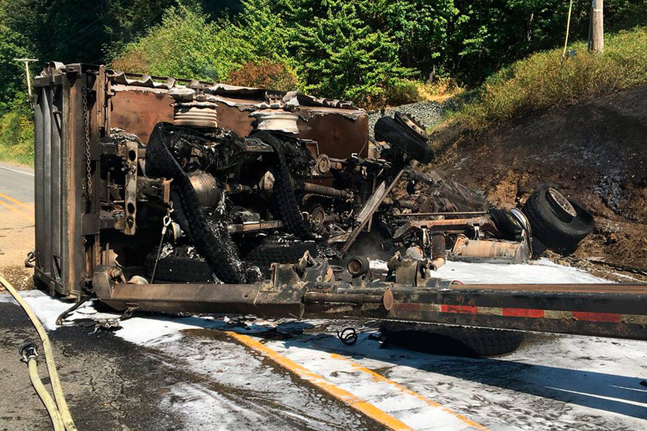 The dump truck was engulfed in flames when first responders arrived on the scene. Photos courtesy of Washington State Patrol Trooper Rick Johnson