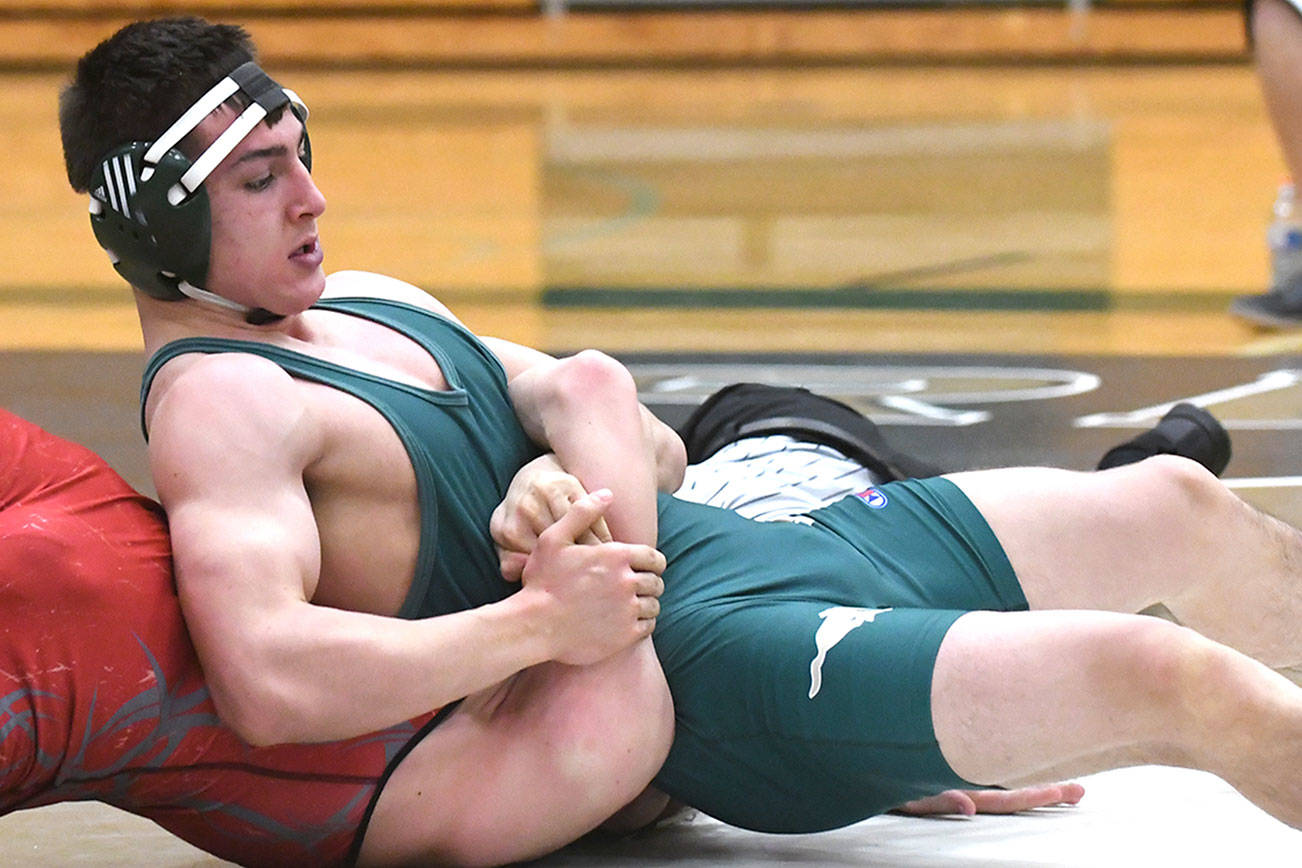 Lui takes charge on the wrestling mat