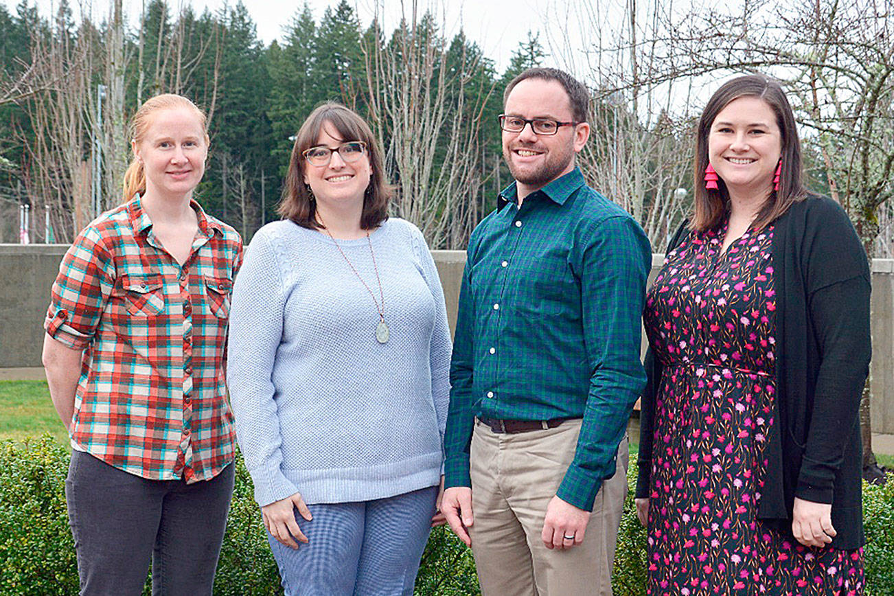 From left: Tara Martin, Lisa Snow, Jeff LaBelle, and Jessica Rice completed the challenging process of earning National Board Certification. The National Board Certified Teachers teach at Eastside Catholic School in Sammamish. Photo Courtesy of Eastside Catholic School.