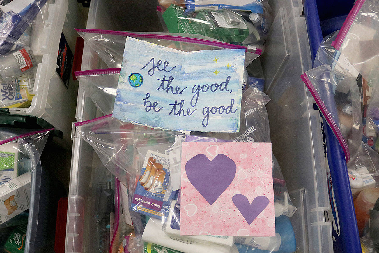 St. Jude Parish members assembled Need Kits with hygiene products at the annual Service Day on March 30. Need Kits were also assembled by elders of 10 assisted living communities. The elderly also donated motivational art cards to put inside each kit. Stephanie Quiroz/staff photo