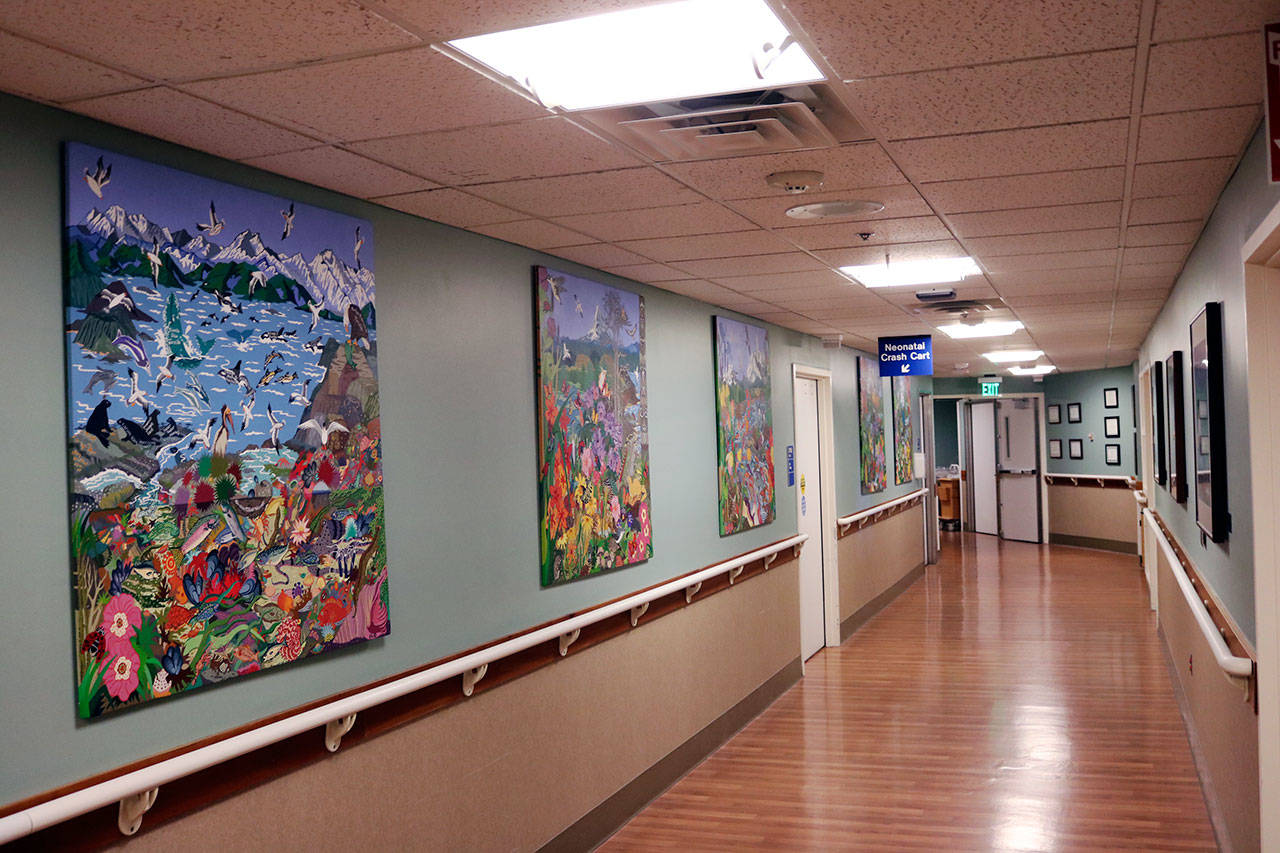 The hallways of EvergreenHealth’s Family Maternity Center feature designs and art that was put in over two decades ago. Officials hope the modernization will better serve laboring mothers and their families. Kailan Manandic/staff photo