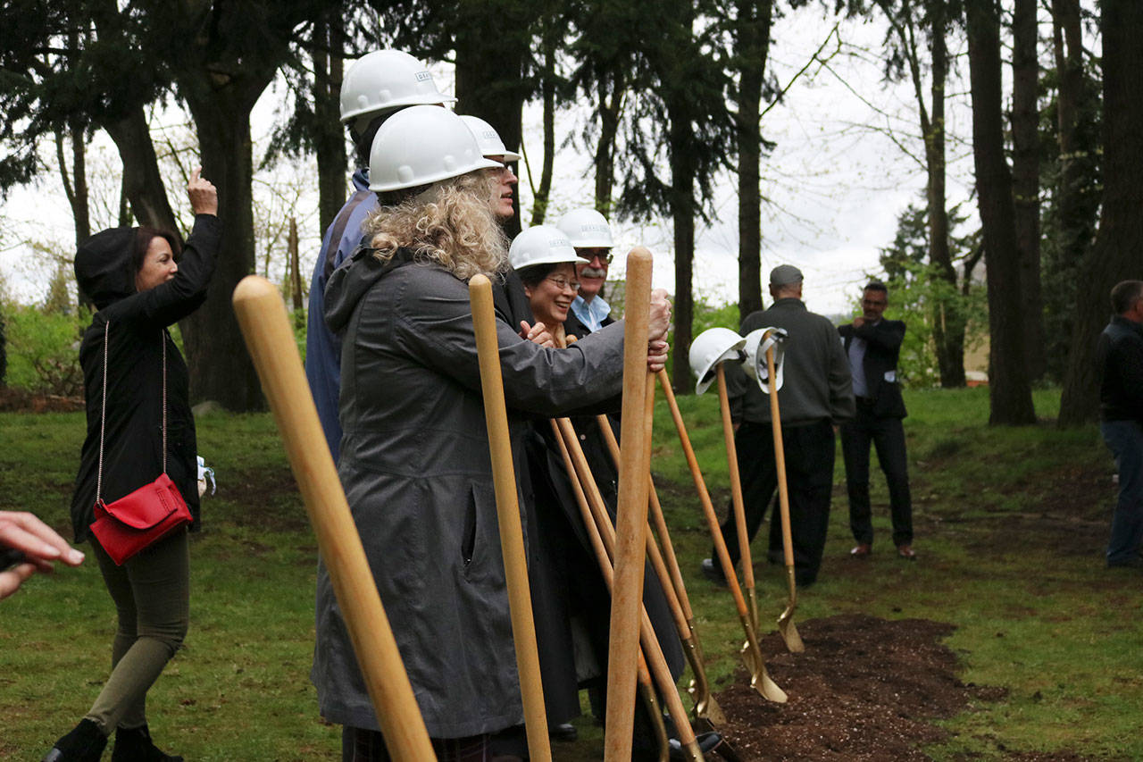 Kailan Manandic/staff photo                                 Officials break ground outside Salt House Church for the Eastside’s first permanent women and family shelter. Workers hope to complete construction in 2020.