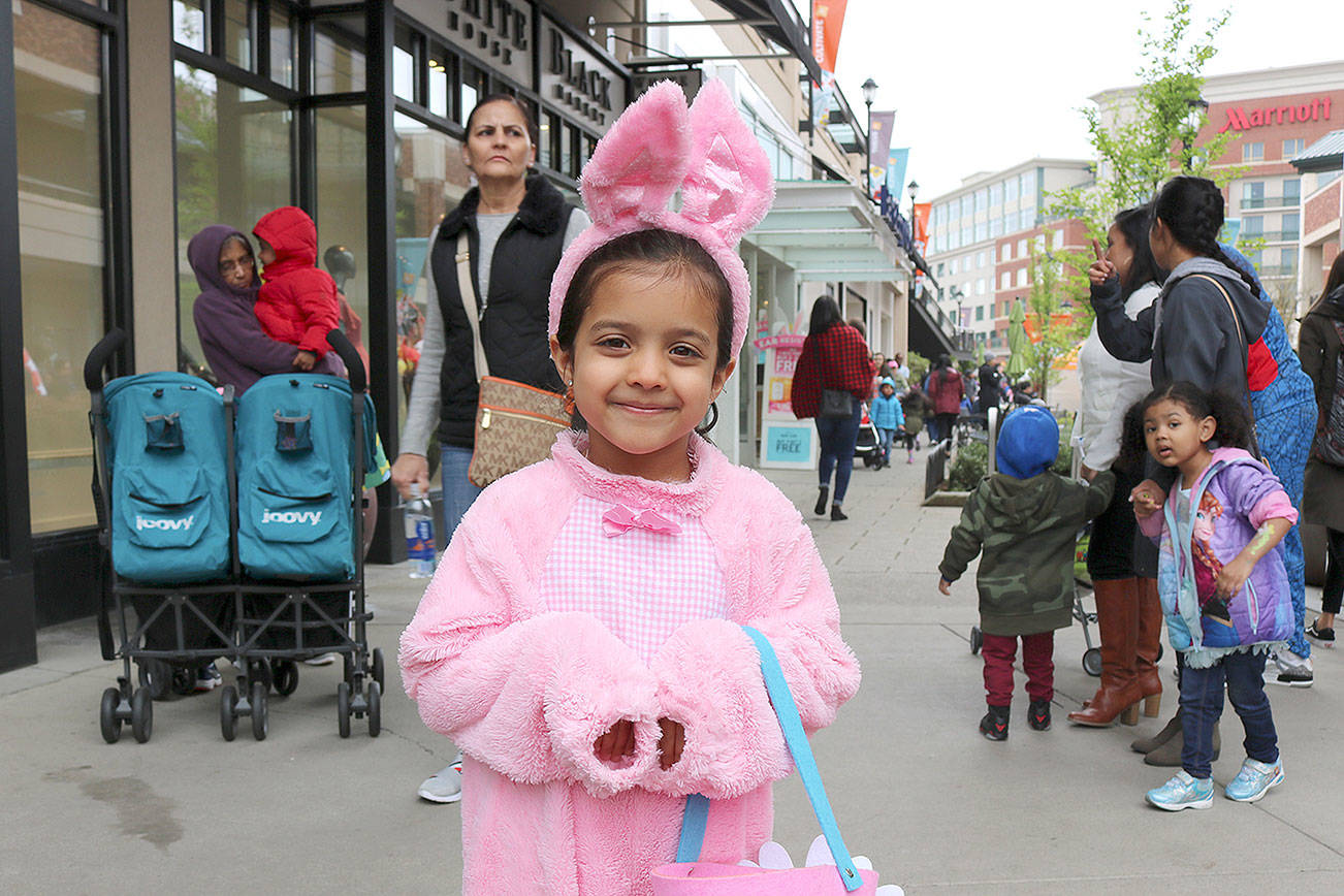 The Bhatia family of Redmond, brought their 6 year old daughter to the Redmond Town Center Eggstravaganza on April 20. Stephanie Quiroz/staff photo