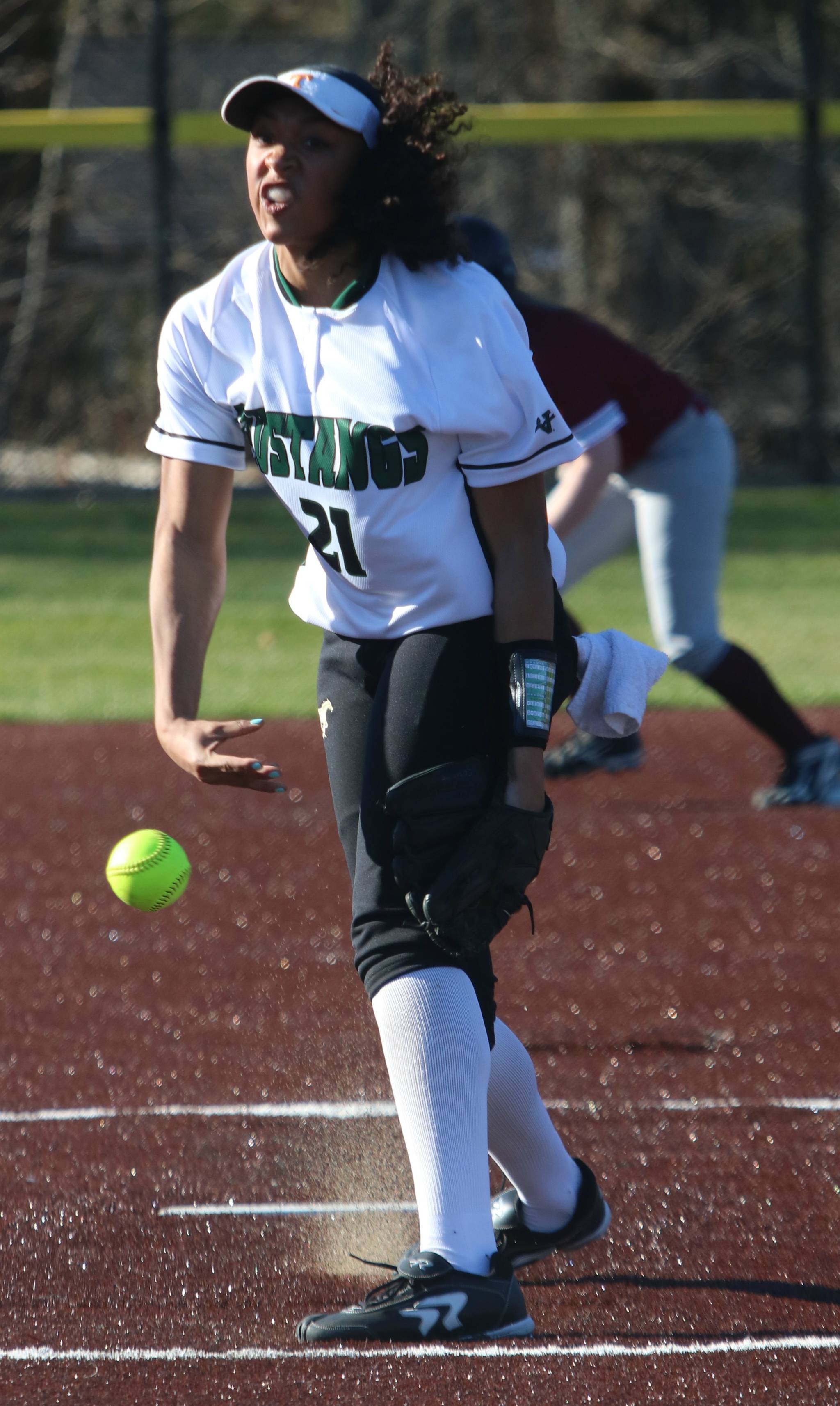 Redmond’s Kiki Milloy unleashes a pitch against Eastlake. Andy Nystrom / staff photo