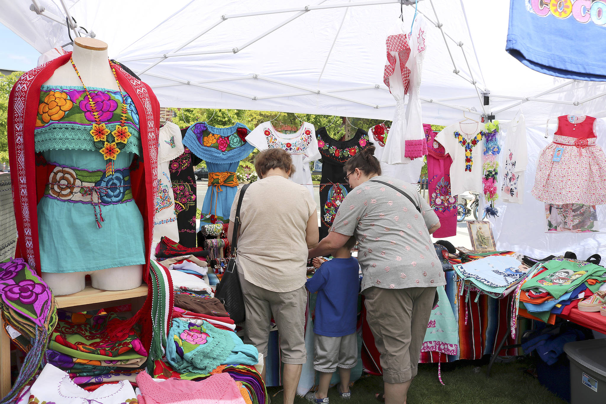 Various booths included traditional Mexican clothes, jewelry, art, and more. Stephanie Quiroz/staff photo