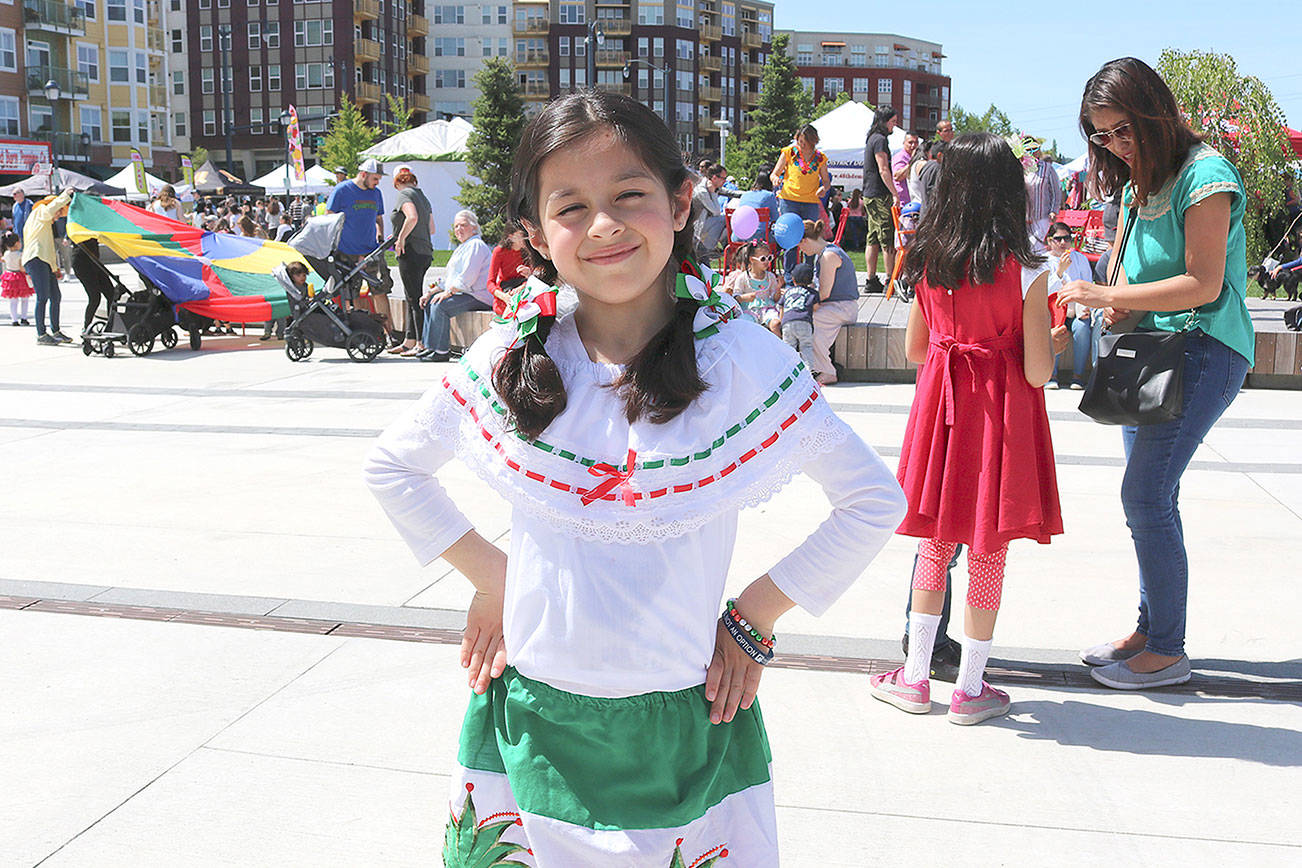 Isabella, 8, from Sammamish wears a traditional Mexican dress at the first Cinco de Mayo festival in Redmond on May 5.