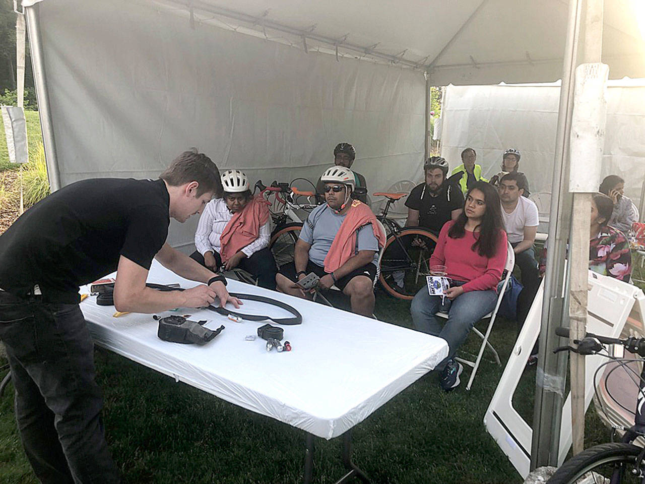 New riders and experienced bike commuters learning from local bike shops at the skills clinics during Bike Bash on May 17. Courtesy photo of Go Redmond Facebook.